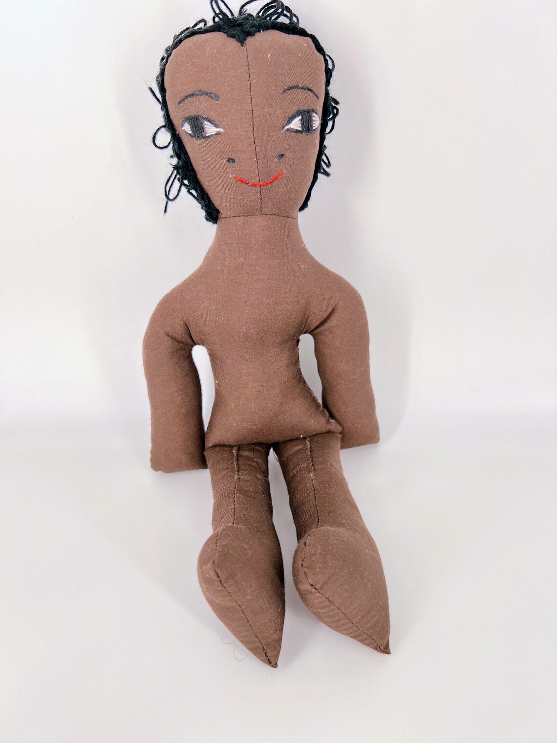 African Doll wearing a gomesi dress - Image 6