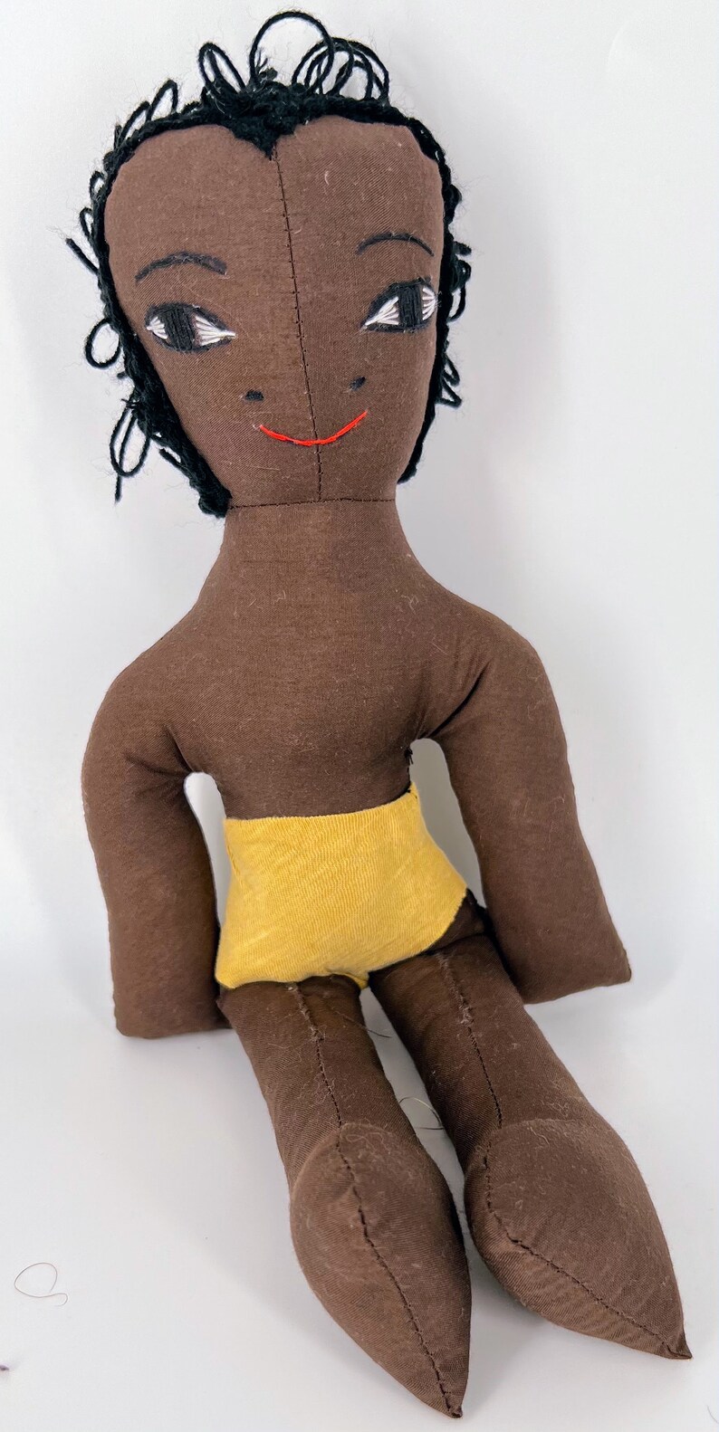 African Doll wearing a gomesi dress - Image 5